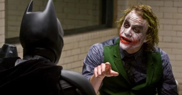  Batman interrogates the Joker